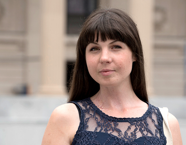 Bronwen Garand-Sheridan, who received palliative care in her early 20s in Winnipeg while she battled lymphoma, stands on the campus of Yale University in New Haven, Connecticut, where she is currently pursuing her PhD.